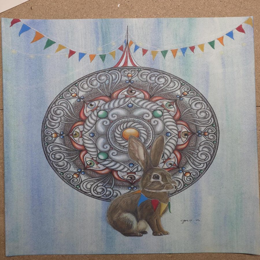 Circular drawing on a blue striped circus background with pennant bunting and a bunny